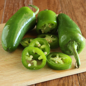 Jalapeno peppers on a cutting board