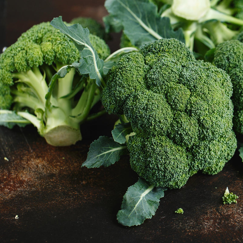Broccoli heads on table